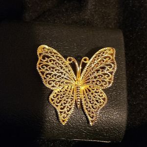 Gold tone butterfly pin